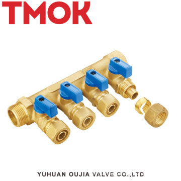 brass color four-way water manifold